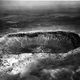 An ancient, 600 foot deep, mile-wide meteor crater near Winslow, Arizona.